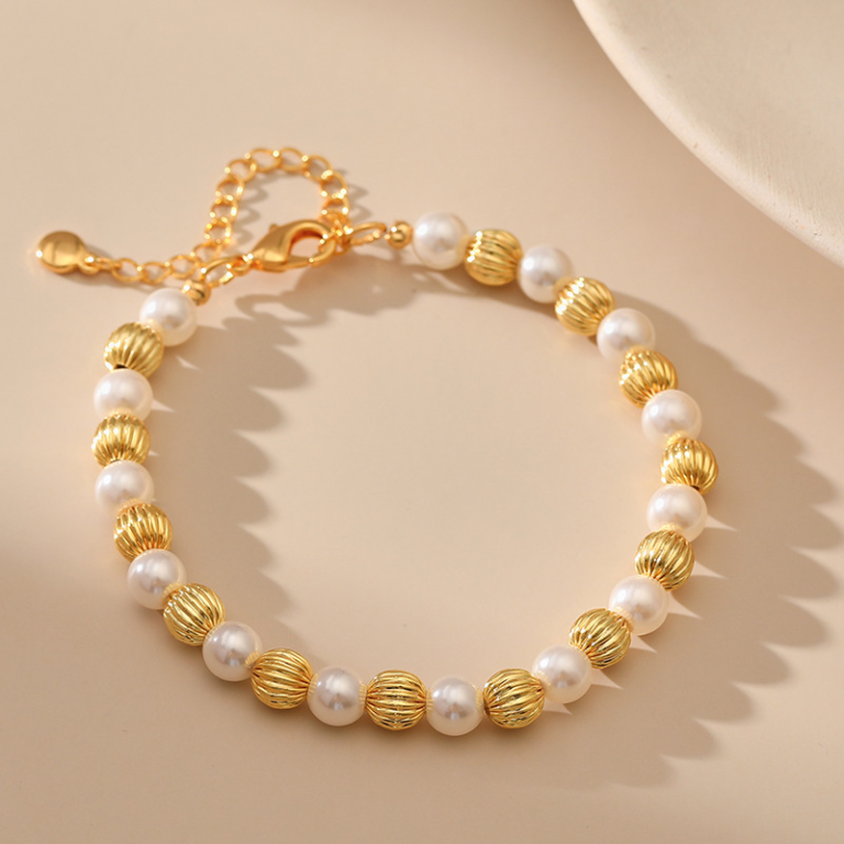 Gold Tone Ribbed Bead Pearl Look Bracelet — second view
