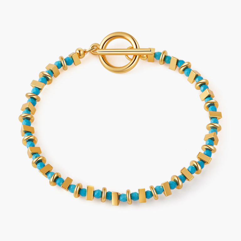Gold Tone Blue Bead Toggle Bracelet — product view