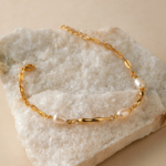 Gold Tone Fine Chain Pearl Look Bracelet — second view thumbnail