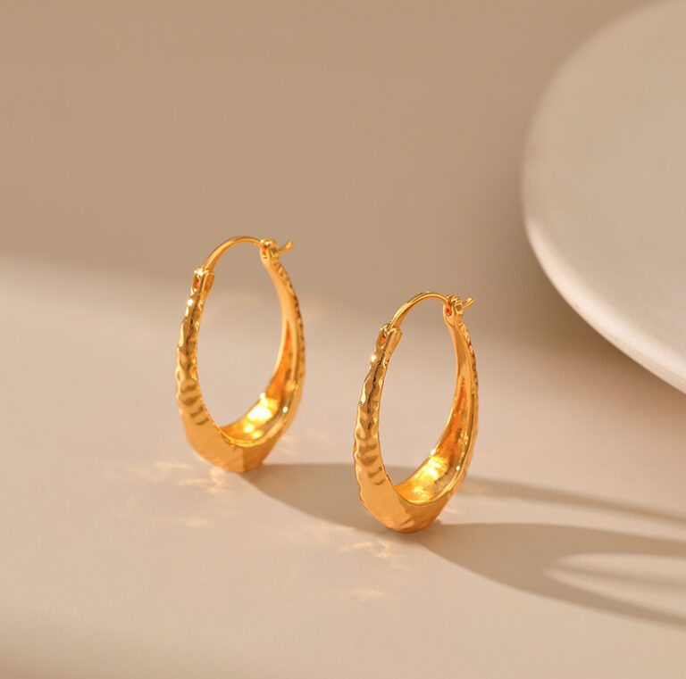 Gold Tone Hammered Teardrop Hoop Earrings — product view