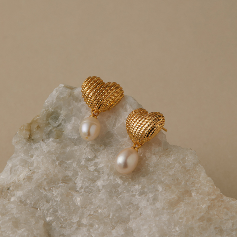Gold Tone Textured Heart and Pearl Look Drop Earrings — product view