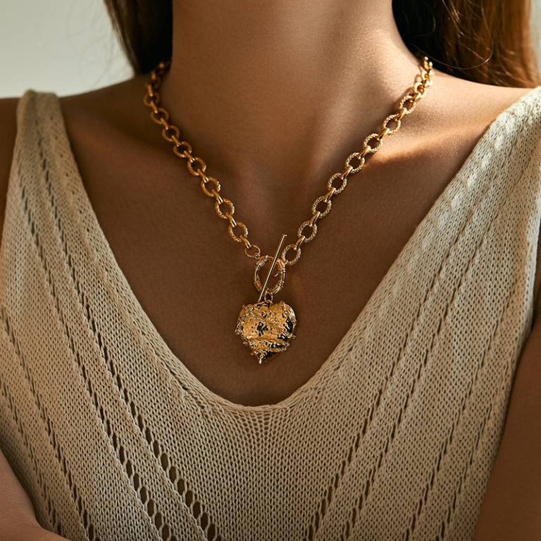 Gold Tone Textured Heart Toggle Necklace — second view