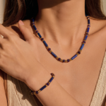 Gold Tone Navy Bead Bar Necklace — second view thumbnail