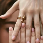 Gold Tone Graduated Bead Open Ring — second view thumbnail